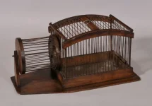Old pet cage with wheel 2.webp